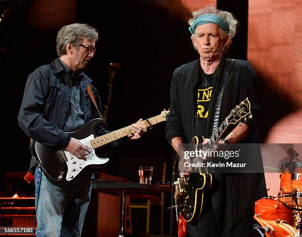 Eric Clapton and Keith Richards perform on stage during the 2013 Crossroads Guitar Festival at Madison Square Garden on April 13, 2013 in New York...