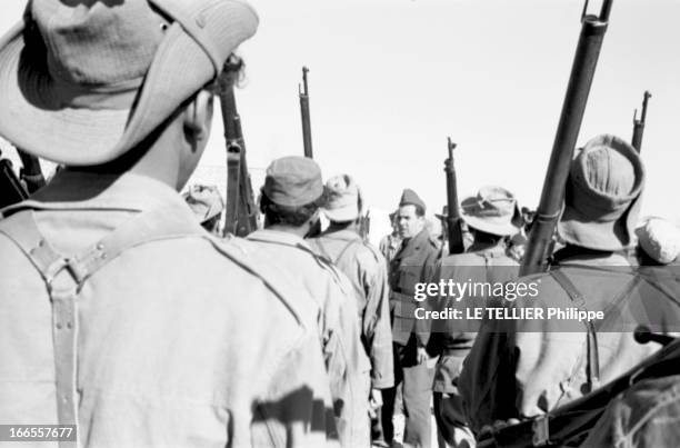 General Bellounis Joined The French Army. Guerre d'Algérie : Dar-Chioukh , décembre 1957 : le général BELLOUNIS passant ses troupes en revue,...