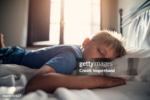 Little boy sleeping on sunny morning. Little boy sleeping on sunny morning.