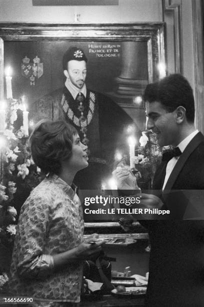 Evening Paul Louis Weiller. 1960, le 18 juin, portrait de la comédienne Annie FARGUE et du compositeur et interprête Guy BEART, lors d'une réception...
