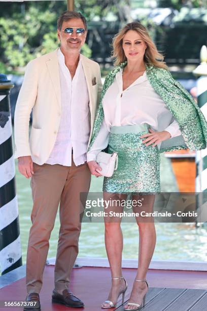 Beppe Convertini and Anna Falchi arrive at the Hotel Excelsior pier for the 80th Venice International Film Festival 2023 on September 07, 2023 in...
