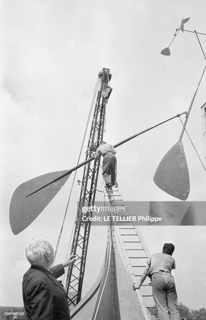 Sculptor Alexander Calder Makes A Mobile For The Palace Of Unesco