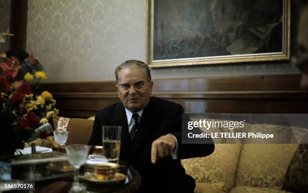 Close-Up Of Tito, Marshal Of Yugoslavia. En Yougoslavie, en novembre 1968, TITO, en costume cravate, avec des lunettes, assis dans un canapé, devant...