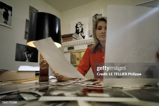 Agathe Gaillard As 'Marianne' And Jean Philippe Charbonnier. En novembre 1968, Agathe GAILLARD, dans un bureau, décoré de photos aux murs, attablée...