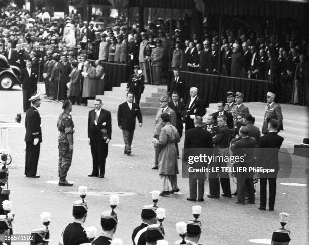 Military Review Of July 14Th. Paris, le 14 juillet 1956, le défilé sur les Champs Elysées. Le président de la république, René COTY, devant la...