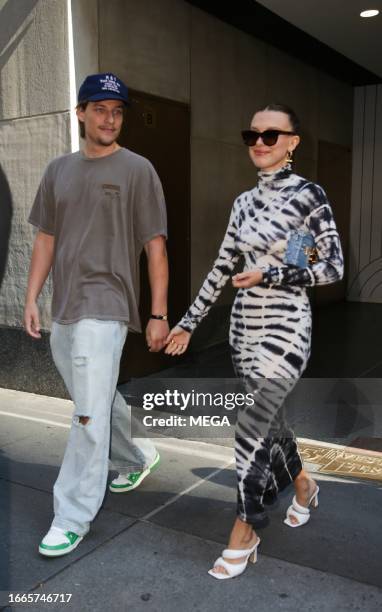 Jacob Bongiovi and Millie Bobbie Brown are seen leaving the Today show on September 14, 2023 in New York, New York.