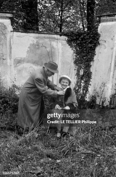 Rendezvous With Angelina Bardin. Sarthe- 12 Novembre 1956- Dans son village, Angelina BARDIN, romancière de la campagne sarthoise, vêtue d'un manteau...