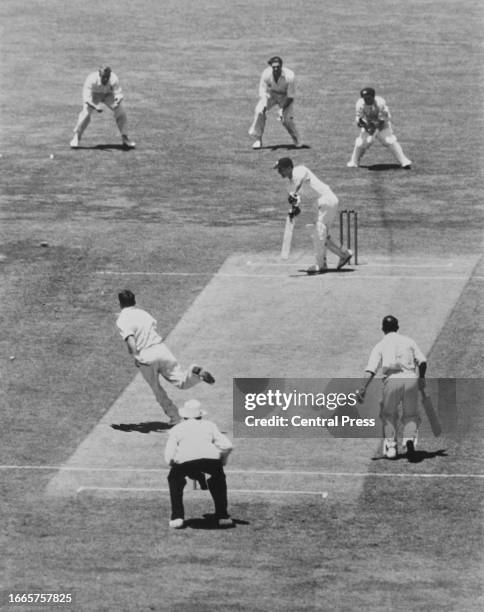 England batsman Len Hutton hits a ball from Australian bowler Ray Lindwall through the covers, during England's first innings at the Third Test in...