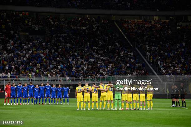 Players and officials observe a minute's silence for the victims of the earthquake in Morocco and the floods in Libya prior to the UEFA EURO 2024...