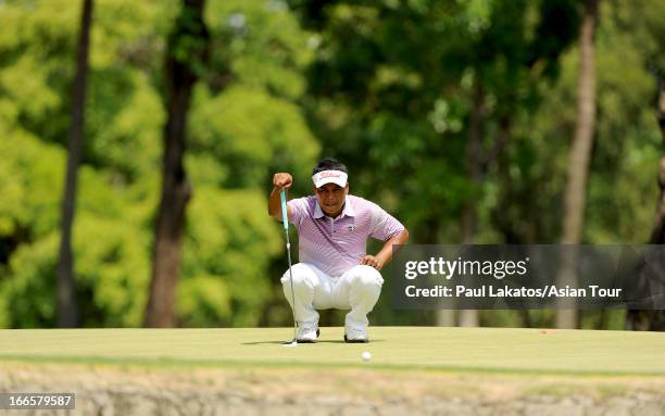 Elmer Salvador of the Philippines in action during day four of the Solaire Open at Wack Wack Golf and Country Club on April 14, 2013 in Manila,...