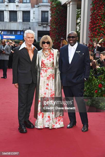 Baz Luhrmann, Dame Anna Wintour and Editor-In-Chief of British Vogue Edward Enninful attend Vogue World: London 2023 at the Theatre Royal Drury Lane...