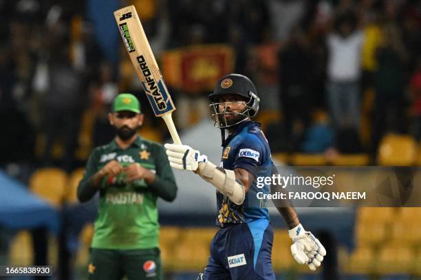 Sri Lanka's Kusal Mendis celebrates his fifty score during the Asia Cup 2023 Super Four one-day international cricket match between Sri Lanka and...