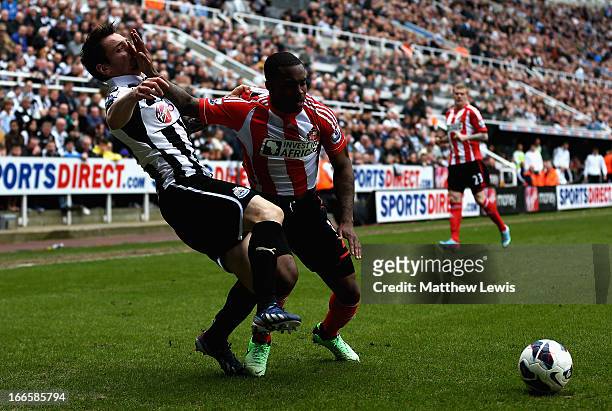 Mathieu Debuchy of Newcastle and Danny Rose of Sunderland challenge for the ball during the Barclays Premier League match between Newcastle United...