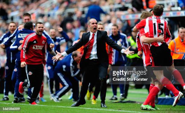 Sunderland manager Paolo Di Canio celebrates with the team after the third Sunderland goal during the Barclays Premier League match between Newcastle...
