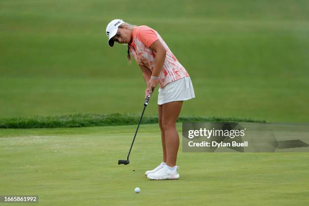 Amateur Mia Hammond of the United States putts on the fourth green during the first round of the Kroger Queen City Championship presented by P&G at...