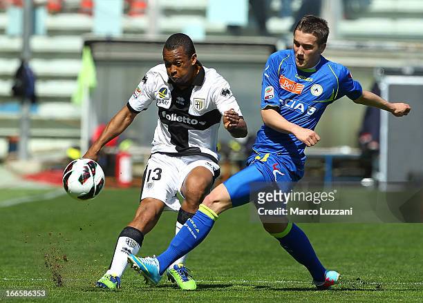 Fabiano Santacroce of Parma FC competes for the ball with Piotr Zielinski of Udinese Calcio during the Serie A match between Parma FC and Udinese...