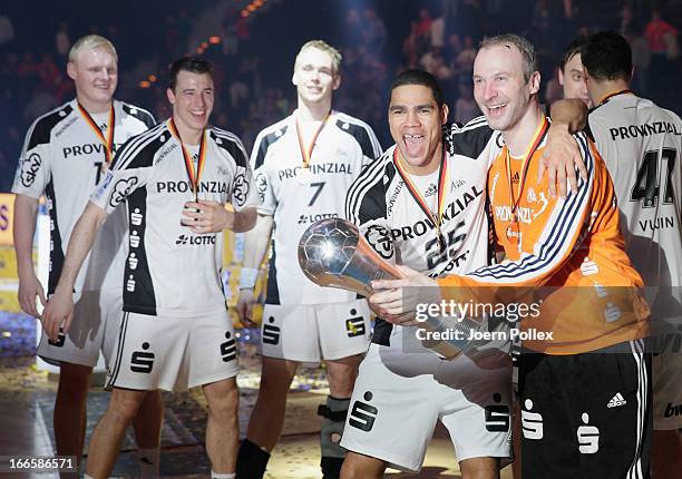 The player of Kiel celebrate with the cup after winning the Lufthansa Final Four Final between THW Kiel and SG Flensburg-Handewitt at O2 World on...