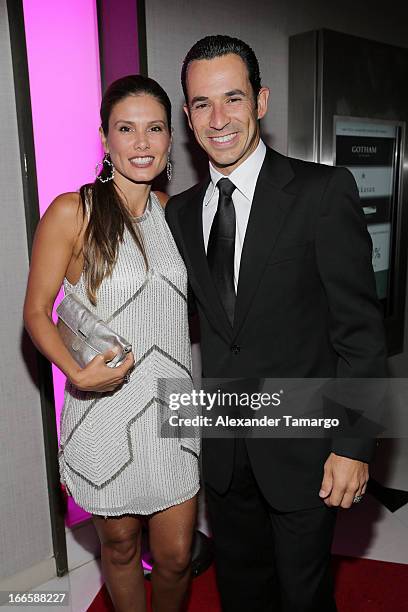 Adriana Henao and Helio Castroneves arrive at the Blacks' Annual Gala at Fontainebleau Miami Beach on April 13, 2013 in Miami Beach, Florida.