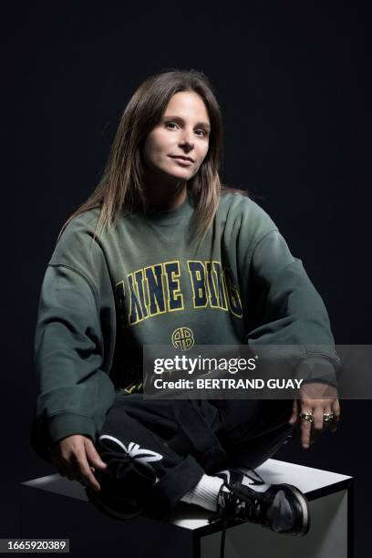French surfer and youtuber Manon Lanza poses during a photo session in Paris on September 13, 2023. The surfer and Youtuber Manon Lanza was the...