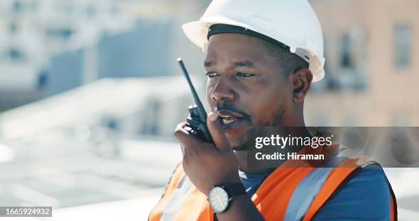 communication, radio and engineering man for solar panels, renewable energy and urban city development. technician, project manager or african person at outdoor building, grid check and walkie talkie - electrical safety stock pictures, royalty-free photos & images