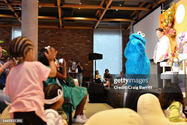 Cookie Monster and Dr. Rosemarie Truglio speak onstage during "Mindful Families" presented by Headspace in partnership with Sesame Street and Unicorn...