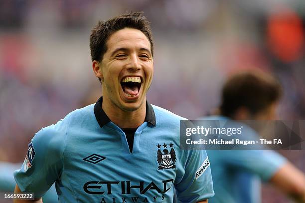 Samir Nasri of Manchester City celebrates scoring the opening goal during the FA Cup with Budweiser Semi Final match between Chelsea and Manchester...