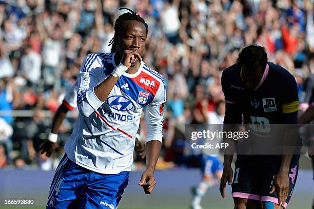 Lyon's Burkinabe defender Bakary Kone celebrates after scoring a goal during the French L1 football match Olympique Lyonnais vs Toulouse Football...