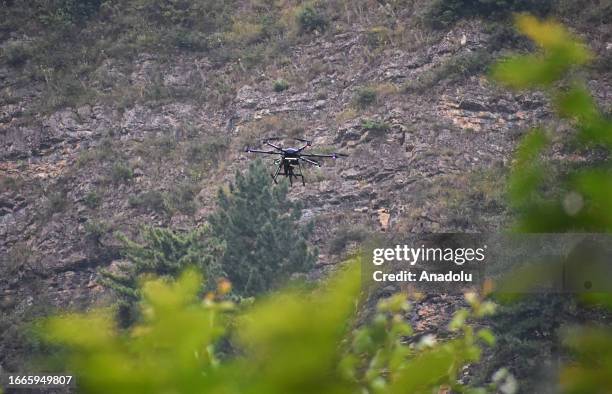 Drone operated by Indian army is seen near the site of gun-battle which entered second day in Gadole village of Kokernag in Anantnag district of...