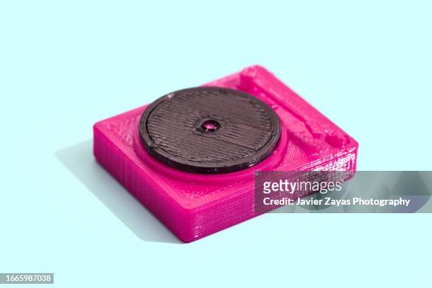 purple record player on green background - country rock music stock pictures, royalty-free photos & images