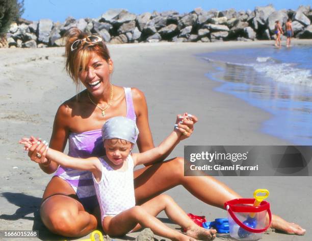 Venezuelan actress and model Catherine Fulop with her daughter Oriana, Caracas, Venezuela, 1998