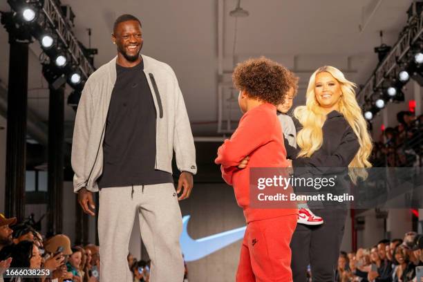 Julius Randle and Kendra Shaw Randle walk the runway during the 13th Annual Rookie USA Fashion Show at Iron 23 on September 06, 2023 in New York City.