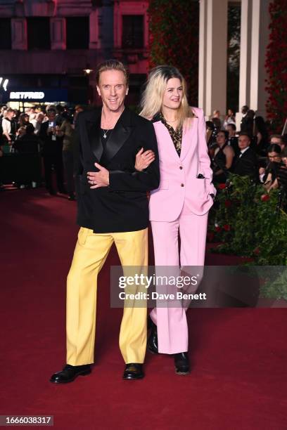 Damian Lewis and Alison Mosshart attend Vogue World: London 2023 at the Theatre Royal Drury Lane on September 14, 2023 in London, England.