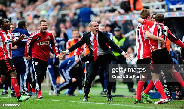 Sunderland manager Paolo Di Canio celebrates with the team after the third Sunderland goal during the Barclays Premier League match between Newcastle...