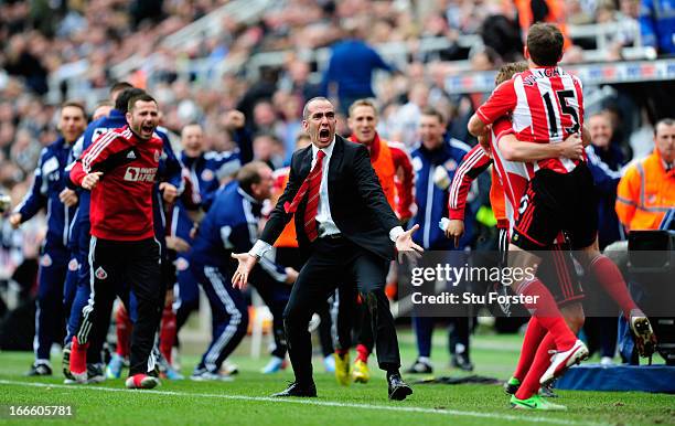 Sunderland manager Paolo Di Canio celebrates with the team after the third Sunderland goal during the Barclays Premier League match between Newcastle...