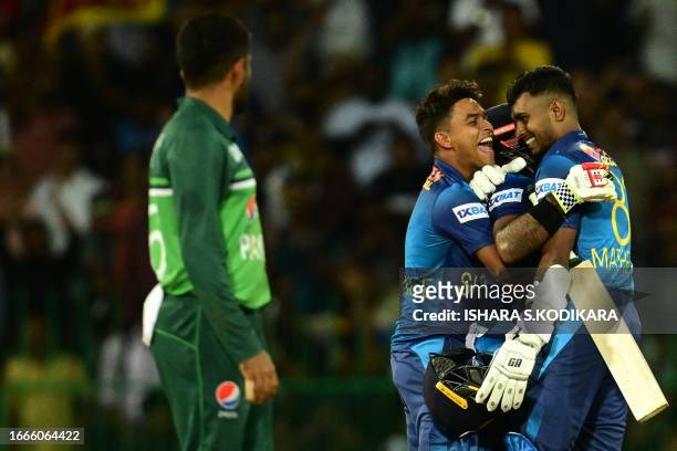 Sri Lanka's players celebrate after Sri Lanka's victory by 2 wickets after the Asia Cup 2023 Super Four one-day international cricket match between...
