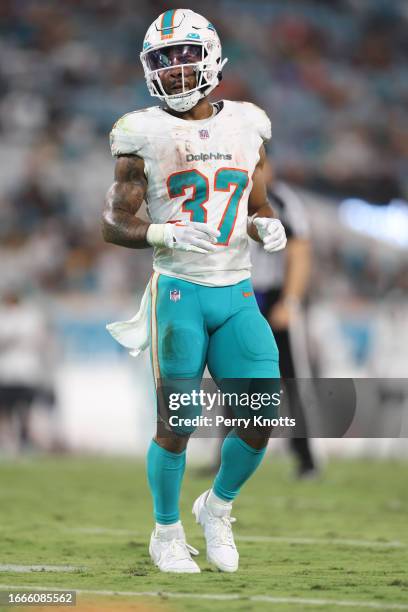 Myles Gaskin of the Miami Dolphins lines up on the line of scrimmage against the Jacksonville Jaguars during the second half at EverBank Stadium on...