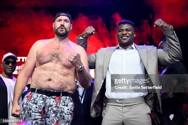 Tyson Fury and Francis Ngannou face off during a Tyson Fury v Francis Ngannou Press Conference at HERE on September 07, 2023 in London, England.