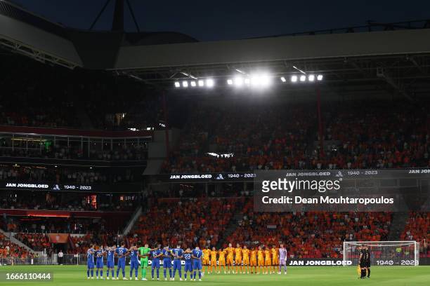 Players, match officials and fans take part in a minute's silence for the late Jan Jongbloed prior to the UEFA EURO 2024 European qualifier match...