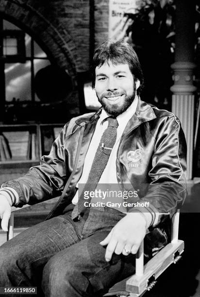 View of American computer engineer and programmer Steve Wozniak, co-founder of Apple Computer, as he sits in a director's chair during an interview...