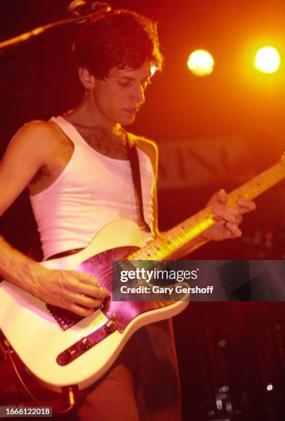 American Rock musician Jack Sherman , of the group Red Hot Chili Peppers, plays guitar onstage at Irving Plaza, New York, New York, August 4, 1984.