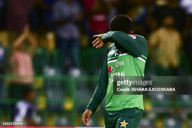 Pakistan's captain Babar Azam walks back to the pavilion after Sri Lanka won by 2 wickets during the Asia Cup 2023 Super Four one-day international...