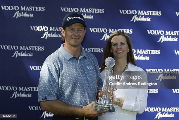 Retief Goosen of South Africa and his wife Tracy pose with the Order of Merit trophy after the Volvo Masters at the Valderrama Golf Club, Andalucia,...
