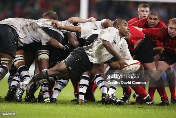 Jacob Rauluni of Fiji passes the ball during the International Friendly match between Wales and Fiji held on November 9, 2002 at the Millennium...