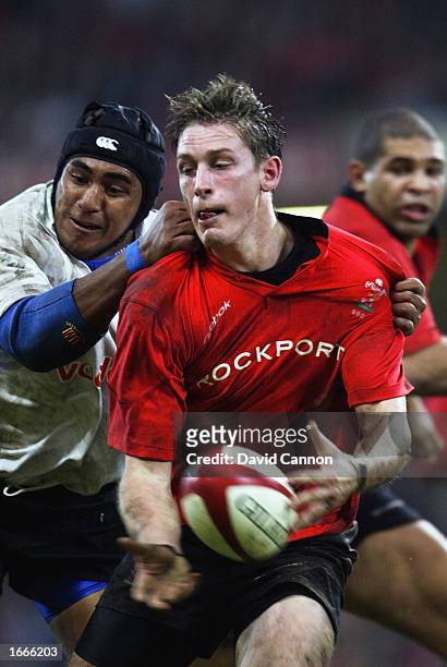 Jamie Robinson of Wales passes the ball during the International Friendly match between Wales and Fiji held on November 9, 2002 at the Millennium...