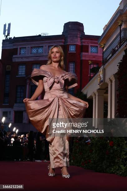 British model Georgia May Jagger poses upon arrival to attend the "Vogue World: London" event at the Theatre Royal Drury Lane in central London on...