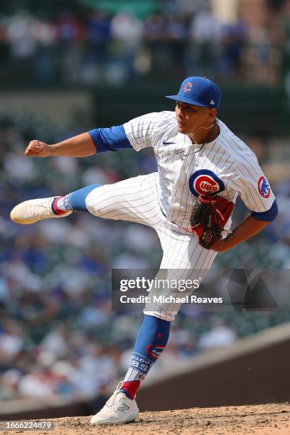Daniel Palencia of the Chicago Cubs delivers a pitch against the San Francisco Giants during the eighth inning at Wrigley Field on September 06, 2023...