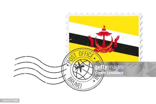 brunei grunge postage stamp. vintage postcard vector illustration with bruneian national flag isolated on white background. retro style. - brunei stock illustrations