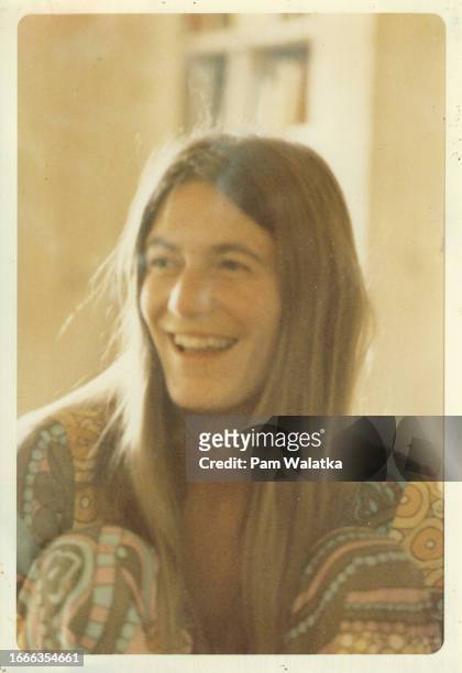 View of artist Linda Cross as she laughs at the Esalen Institute, Big Sur, California, 1968. The institute was founded in 1962 to focus on...