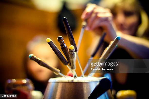 fondue with friends - fondue stock pictures, royalty-free photos & images
