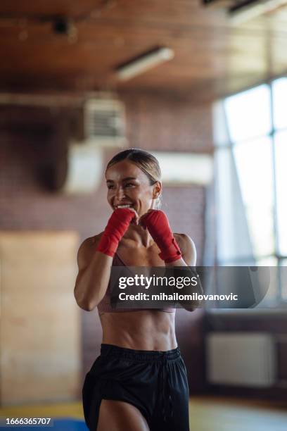 smiling during a workout - kickboxing equipment stock pictures, royalty-free photos & images